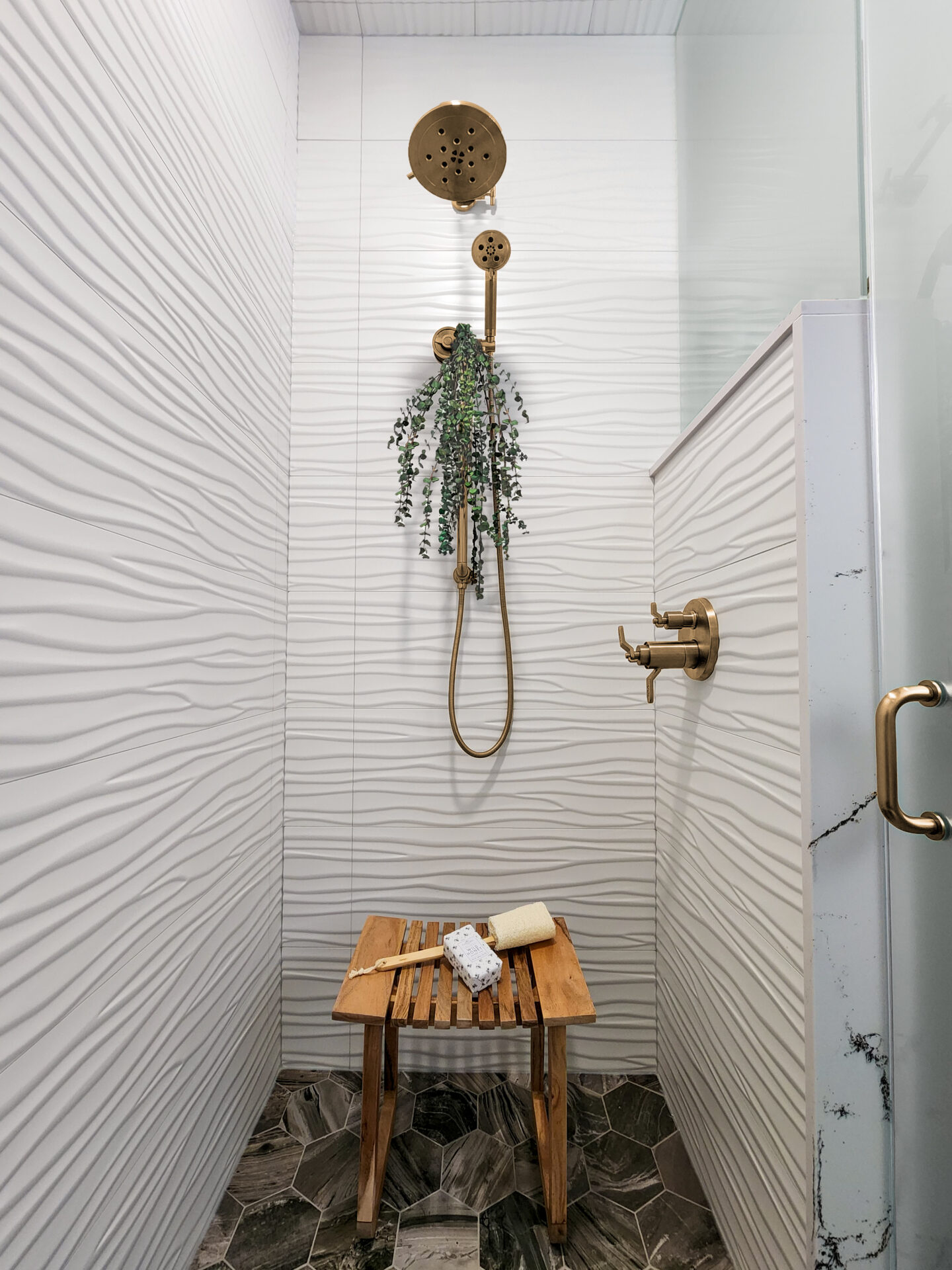 Custom tiled shower with Champagne Bronze fixtures
